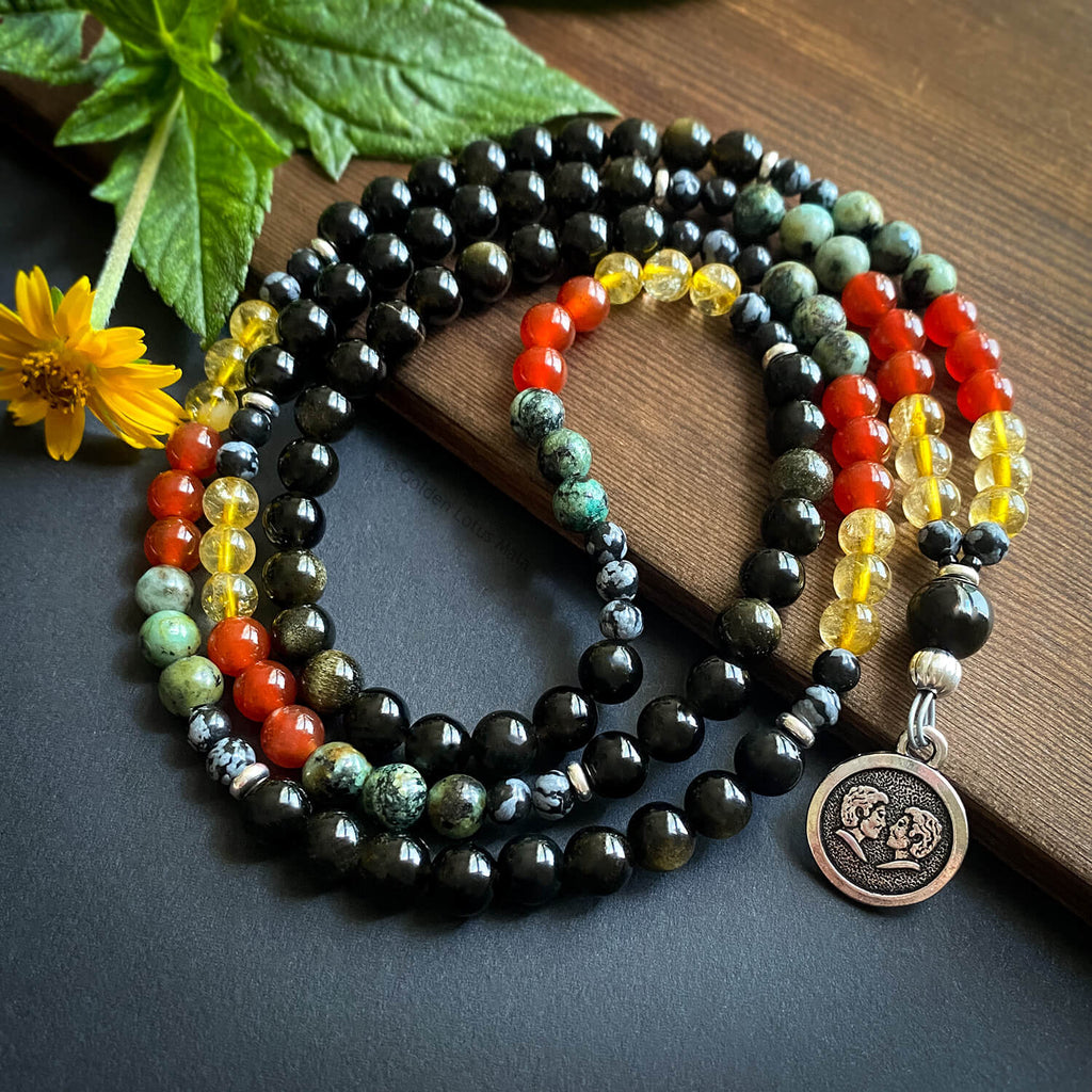 African turquoise and lava stone mala with a carnelian pendant deals